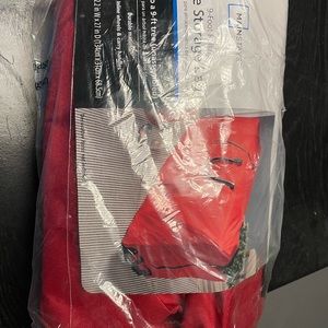 Christmas tree bag. Never opened. Boyfriend got a real tree so didn’t need it.